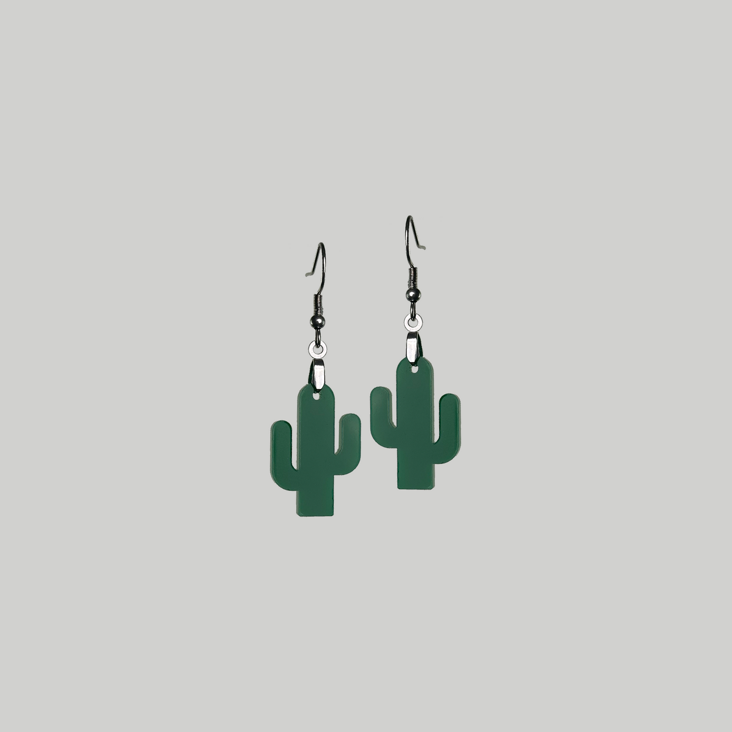 Green Cactus Style Earrings: Fashion-forward accessories featuring adorable cactus motifs for a playful and on-trend look.