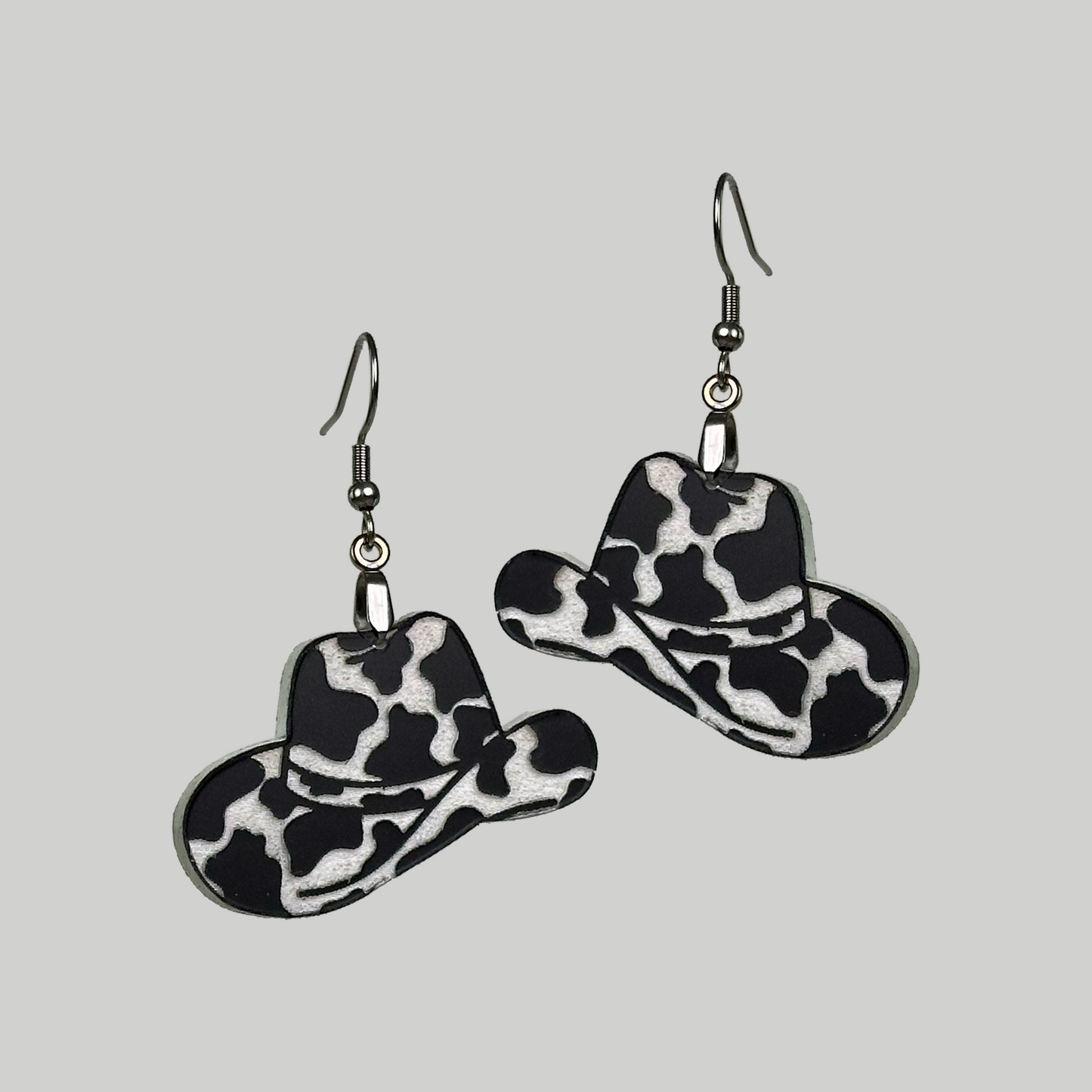 Cowboy Hat Earrings: Western-inspired and stylish, these earrings feature miniature cowboy hat designs by Our Family Designs.