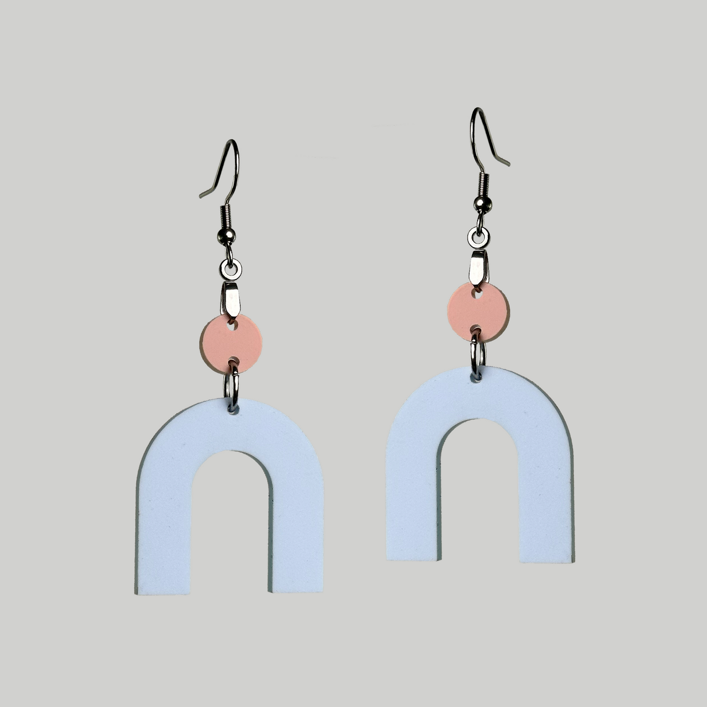Rainbow Shaped Earrings: Vibrant and stylish accessories for a colorful statement.