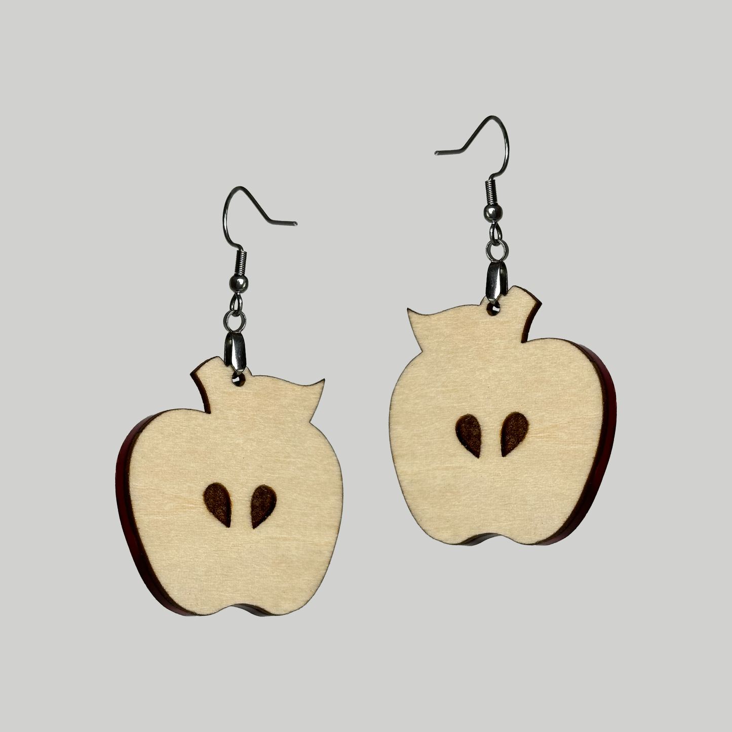 Apple Earrings: Unique fruit-inspired adornments for a touch of playful elegance by Our Family Designs.