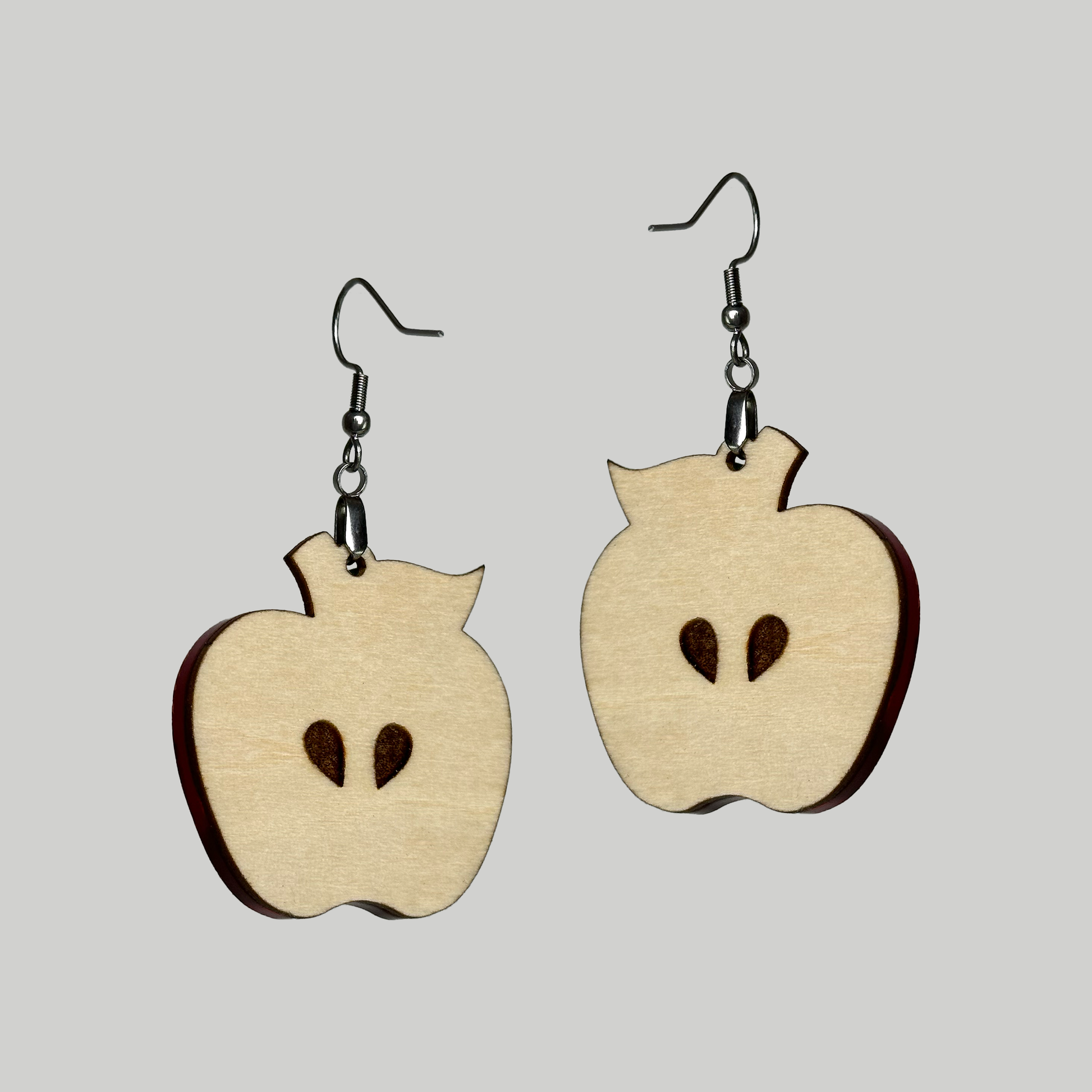 Apple Earrings: Unique fruit-inspired adornments for a touch of playful elegance by Our Family Designs.