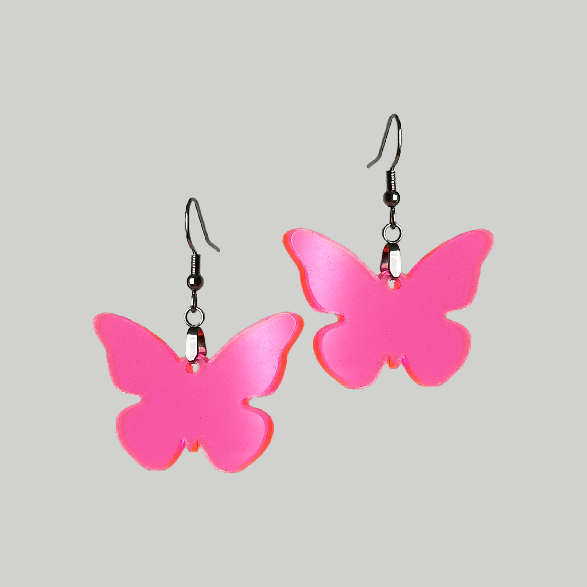 Winged Beauties: Elegant butterfly earrings designed to add a touch of charm and beauty to your ensemble.