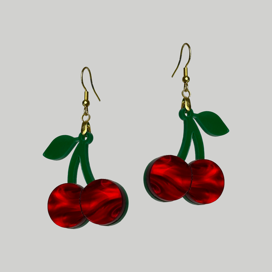 Cherry Earrings: Sweet and stylish, these earrings showcase adorable cherry trend for a playful and fruity touch.
