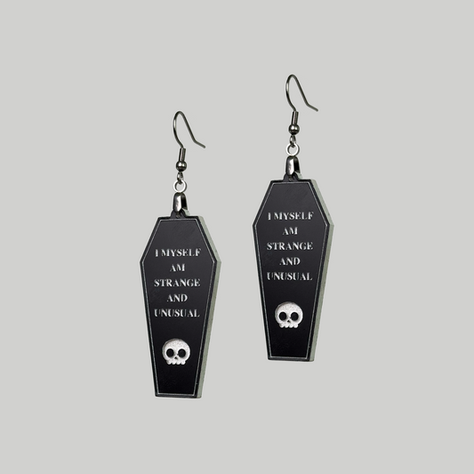 Beetle Coffin Earrings: Uniquely stylish, these earrings showcase beetle motifs within coffin shapes for a distinctive and mysterious charm.