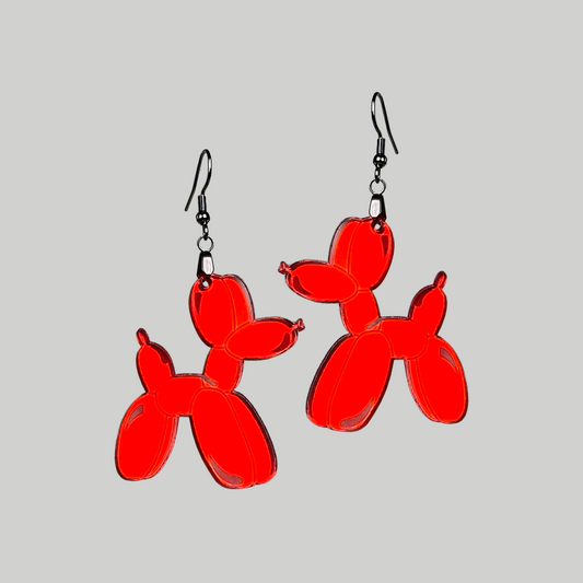 Earrings featuring a balloon animal-shaped dog, a playful and charming accessory to showcase your love for whimsical design.