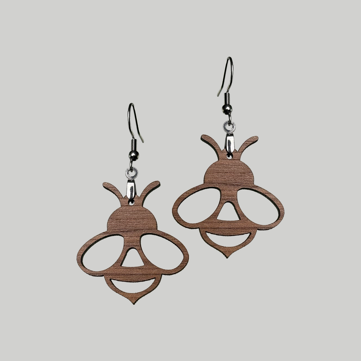 Bee Earrings: Sweet and stylish, these earrings showcase adorable bumble bee designs for a playful and nature-inspired look.
