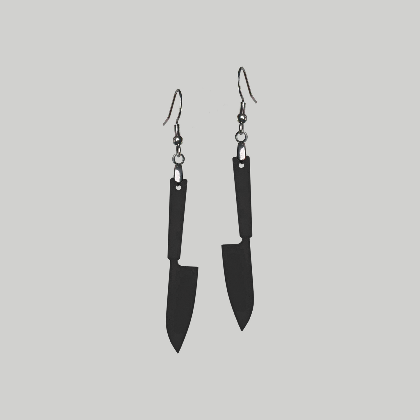 Knife Edge Glam: Make a statement with these knife earrings, blending an edgy aesthetic with a touch of glamorous allure.