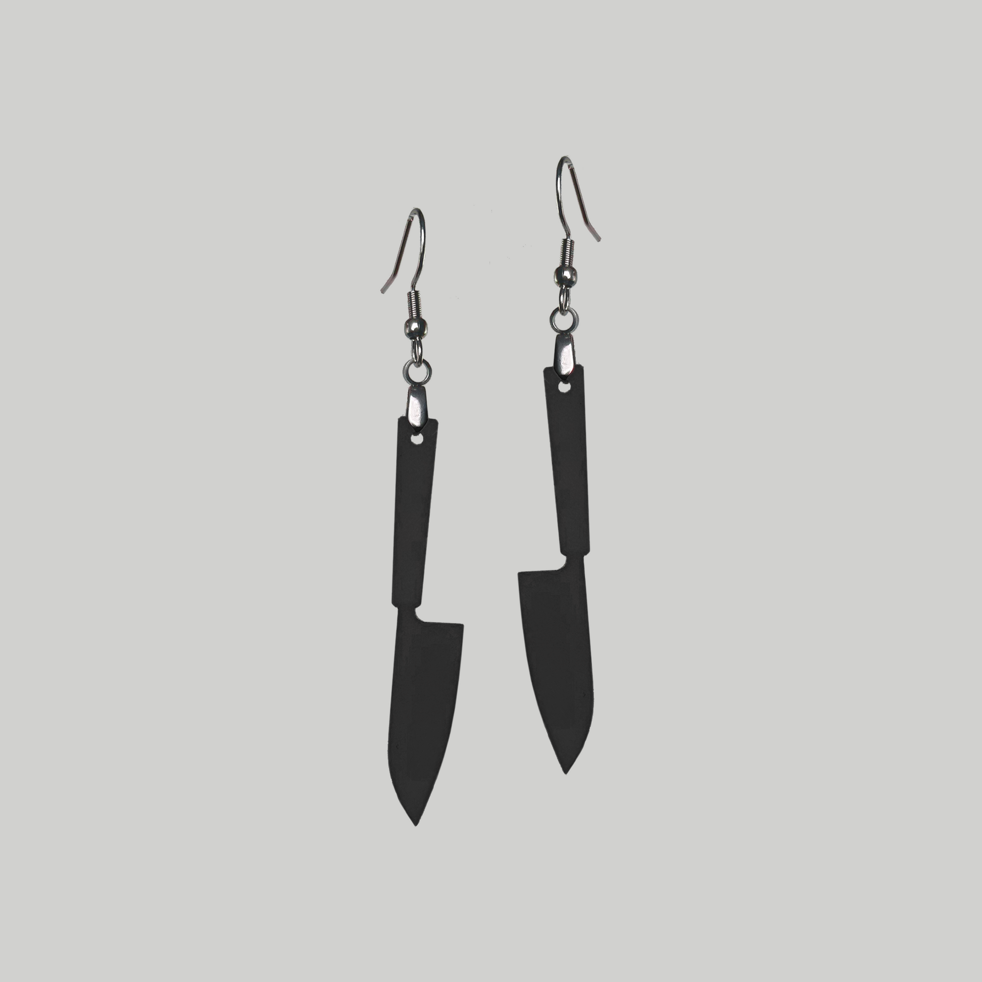 Knife Edge Glam: Make a statement with these knife earrings, blending an edgy aesthetic with a touch of glamorous allure.
