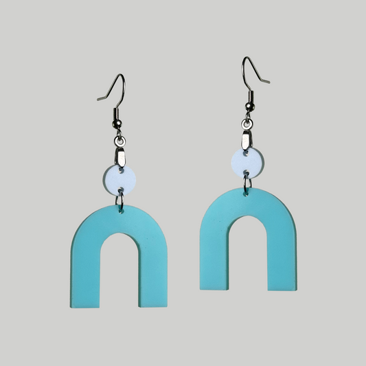 Arch-Shaped Earrings: Contemporary elegance in stylish arch-inspired accessories.