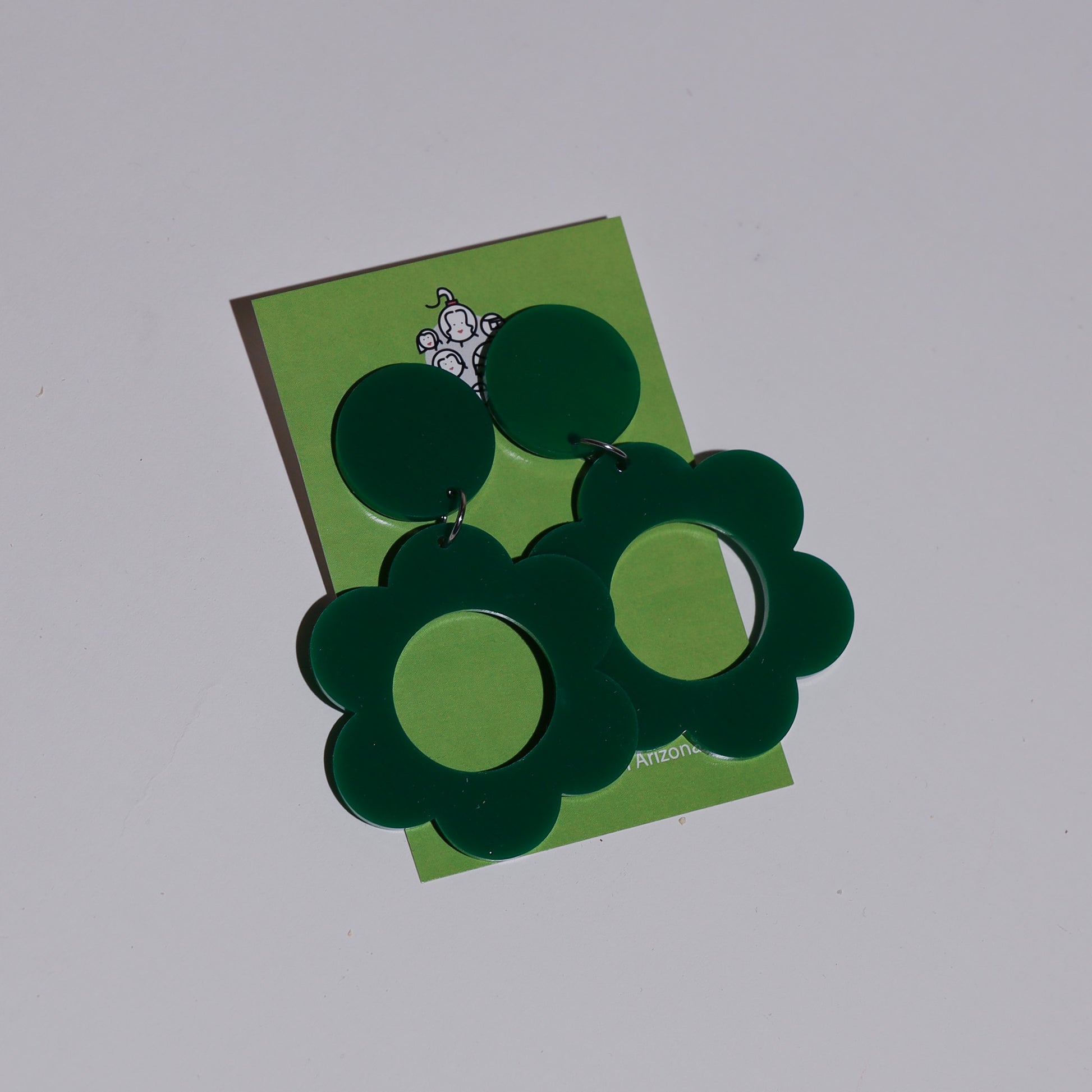Green flower clip on earring